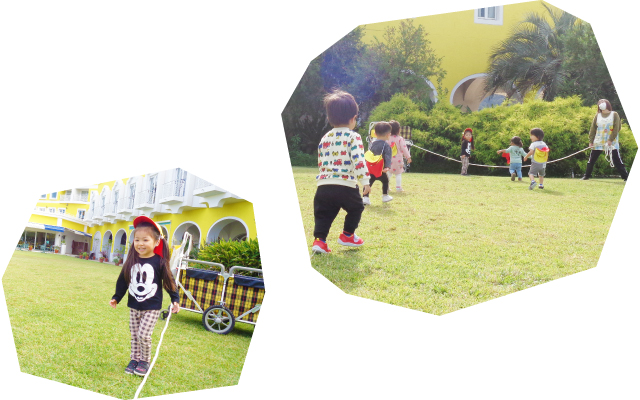 マリーナ保育園_子どもたちが広い芝生で元気いっぱい遊ぶ様子